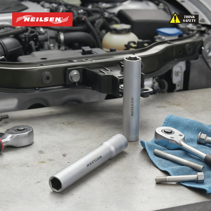 Neilsen tools on a car repair workbench with 'Think Safety' warning label.
